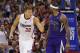 CORRECTS DAY OF WEEK TO SATURDAY. - Los Angeles Clippers forward Blake Griffin, left, reacts after dunking the ball over Sacramento Kings center DeMarcus Cousins, right, during the second half of an NBA basketball game in Los Angeles, Saturday, April 12, 2014. The Clippers won 117-101. (AP Photo/Danny Moloshok)