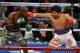 LAS VEGAS, NV - APRIL 12: Timothy Bradley (L) and Manny Pacquiao battle it out during their WBO world welterweight championship boxing match at the MGM Grand Garden Arena on April 12, 2014 in Las Vegas, Nevada. Pacquiao won by unanimous decision. (Photo by David Becker/Getty Images)