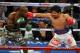 LAS VEGAS, NV - APRIL 12: Timothy Bradley (L) and Manny Pacquiao battle it out during their WBO world welterweight championship boxing match at the MGM Grand Garden Arena on April 12, 2014 in Las Vegas, Nevada. Pacquiao won by unanimous decision. (Photo by David Becker/Getty Images)