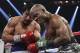 Manny Pacquiao, left, of the Philippines, trades blows with Timothy Bradley, in their WBO welterweight title boxing fight Saturday, April 12, 2014, in Las Vegas. Pacquiao won the bout by unanimous decision. (AP Photo/Isaac Brekken)