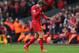 LIVERPOOL, ENGLAND - APRIL 13: Jordan Henderson of Liverpool walks off after being shown a red card by Referee Mark Clattenburg during the Barclays Premier League match between Liverpool and Manchester City at Anfield on April 13, 2014 in Liverpool, England. (Photo by Alex Livesey/Getty Images)