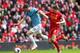 LIVERPOOL, ENGLAND - APRIL 13: Steven Gerrard of Liverpool challenges Edin Dzeko of Manchester City during the Barclays Premier League match between Liverpool and Manchester City at Anfield on April 13, 2014 in Liverpool, England. (Photo by Alex Livesey/Getty Images)