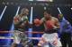 Timothy Bradley, left, and Manny Pacquiao, of the Philippines, face off in their WBO welterweight title boxing fight Saturday, April 12, 2014, in Las Vegas. (AP Photo/Eric Jamison)