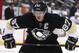 Pittsburgh Penguins' Sidney Crosby (87) prepares to take a face off during an NHL hockey game between the Pittsburgh Penguins and the Tampa Bay Lightning in Pittsburgh, Saturday, March 22, 2014. (AP Photo/Gene J. Puskar)