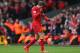 LIVERPOOL, ENGLAND - APRIL 13: Jordan Henderson of Liverpool walks off after being shown a red card by Referee Mark Clattenburg during the Barclays Premier League match between Liverpool and Manchester City at Anfield on April 13, 2014 in Liverpool, England. (Photo by Alex Livesey/Getty Images)