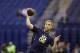 Pittsburgh quarterback Tom Savage throws during a drill at the NFL football scouting combine in Indianapolis, Sunday, Feb. 23, 2014. (AP Photo/Michael Conroy)