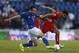 Cruz Azul's Gerardo Torrado, left, fights for the ball with Toluca's Antonio Naelson during a Mexican soccer league match in Mexico City, Saturday, Nov. 30, 2013. (AP Photo/Moises Castillo)