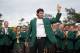 Bubba Watson waves after being presented with his green jacket after winning the Masters golf tournament Sunday, April 13, 2014, in Augusta, Ga. (AP Photo/Matt Slocum)