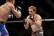Apr 21, 2012; Atlanta, GA, USA; Mark Bocek (right) fights John Alessio in a lightweight bout during UFC 145 at Philips Arena. Mandatory Credit: Paul Abell-USA TODAY Sports