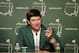 Bubba Watson, speaks during a press conference wearing his green jacket after winning the Masters golf tournament Sunday, April 13, 2014, in Augusta, Ga. (AP Photo/Chris Carlson)
