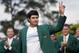 Bubba Watson waves after being presented with his green jacket after winning the Masters golf tournament Sunday, April 13, 2014, in Augusta, Ga. (AP Photo/David J. Phillip)