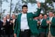 AUGUSTA, GA - APRIL 13: Bubba Watson of the United States poses with the green jacket after winning the 2014 Masters Tournament by a three-stroke margin at Augusta National Golf Club on April 13, 2014 in Augusta, Georgia. (Photo by David Cannon/Getty Images)