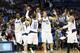 DALLAS, TX - MARCH 25: Dirk Nowitzki #41 of the Dallas Mavericks celebrates with his teammates during the game against the Oklahoma City Thunder on March 25, 2014 at the American Airlines Center in Dallas, Texas. NOTE TO USER: User expressly acknowledges and agrees that, by downloading and or using this Photograph, user is consenting to the terms and conditions of the Getty Images License Agreement. Mandatory Copyright Notice: Copyright 2014 NBAE (Photo by Layne Murdoch/NBAE via Getty Images)