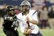 Allen quarterback Kyler Murray (1) runs upfield past Pearland Marlon Walls (28) in the first half during a UIL Class 5A Division I high school football championship game on Saturday Dec. 21, 2013, in Arlington, Texas. (AP Photo/Matt Strasen)