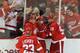 DETROIT, MI - APRIL 02: Gustav Nyquist #14 of the Detroit Red Wings scores a third period game winning goal and is congratulated by his teammates during the game against the Boston Bruins at Joe Louis Arena on April 2, 2014 in Detroit, Michigan. The Red Wings defeated the Bruins 3-2 (Photo by Leon Halip/Getty Images)