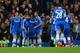 LONDON, ENGLAND - APRIL 05: Willian of Chelsea is congratulated by Branislav Ivanovic and Mohamed Salah of Chelsea on scoring their third goal during the Barclays Premier League match between Chelsea and Stoke City at Stamford Bridge on April 5, 2014 in London, England. (Photo by Mike Hewitt/Getty Images)