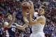 Mar 23, 2014; San Diego, CA, USA; Arizona Wildcats forward Aaron Gordon (right) pulls down a rebound against Gonzaga Bulldogs guard/forward Drew Barham (43) and guard David Stockton in the first half of a men's college basketball game during the third round of the 2014 NCAA Tournament at Viejas Arena. Mandatory Credit: Robert Hanashiro-USA TODAY Sports