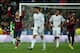 MADRID, SPAIN - MARCH 23: Lionel Messi (L) of Barcelona celebrates scoring his team's third goal with Neymar (R) of Barcelona as Cristiano Ronaldo and Angel Di Maria of Real Madrid look dejected during the La Liga match between Real Madrid CF and FC Barcelona at the Bernabeu on March 23, 2014 in Madrid, Spain. (Photo by Gonzalo Arroyo Moreno/Getty Images)