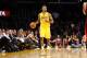 Los Angeles Lakers forward Nick Young dribbles the ball against the Portland Trail Blazers during the second half of an NBA basketball game in Los Angeles, Tuesday, April 1, 2014. The Trail Blazers won 124-112. (AP Photo/Danny Moloshok)