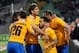 UDINE, ITALY - APRIL 14: Sebastian Giovinco of Juventus is mobbed by team mates after scoring his team's opening goal during the Serie A match between Udinese Calcio and Juventus at Stadio Friuli on April 14, 2014 in Udine, Italy. (Photo by Dino Panato/Getty Images)