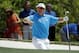 Lee Westwood, of England, looks for his shot out of a bunker on the first fairway during the third round of the Masters golf tournament Saturday, April 12, 2014, in Augusta, Ga. (AP Photo/Matt Slocum)