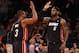 NEW YORK, NY - FEBRUARY 1: Dwyane Wade #3 and LeBron James #6 of the Miami Heat congratulate each other in the closing seconds of a game against the New York Knicks at Madison Square Garden on February. 1, 2014 in New York City. The Heat defeated the Knicks 106-91. NOTE TO USER: User expressly acknowledges and agrees that, by downloading and/or using this Photograph, user is consenting to the terms and conditions of the Getty Images License Agreement. (Photo by Rich Schultz /Getty Images)