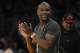 Boxer Floyd Mayweather watches the Los Angeles Lakers play the Boston Celtics during the second half of an NBA basketball game, Friday, Feb. 21, 2014, in Los Angeles. (AP Photo/Mark J. Terrill)