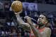 Toronto Raptors forward Amir Johnson is shown during the first half of an NBA basketball game against the Portland Trail Blazers in Portland, Ore., Saturday, Feb. 1, 2014.(AP Photo/Don Ryan)