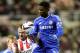 Chelsea's Samuel Eto'o, right, vies for the ball with Sunderland's Lee Cattermole, left, during their English League Cup quarter final soccer match at the Stadium of Light, Sunderland, England, Tuesday, Dec. 17, 2013. (AP Photo/Scott Heppell)