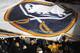 Boston Bruins fans assist in passing around a large Buffalo Sabres logo banner before the first period of an NHL hockey game in Buffalo, N.Y. on Saturday, Jan. 1, 2011. (AP Photo/Don Heupel)