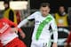 Freiburg's Pavel Krmas , left, challenges for the ball with Wolfsburg's Ivica Olic, during the German first division Bundesliga soccer match between SC Freiburg and VfL Wolfsburg in Freiburg, Germany Sunday Dec. 8, 2013. (AP Photo/dpa, Patrick Seeger)