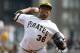 Pittsburgh Pirates starting pitcher Edinson Volquez (36) delivers during the third inning of a baseball game against the St. Louis Cardinals in Pittsburgh Sunday, April 6, 2014. The Pirates won 2-1. (AP Photo/Gene J. Puskar)