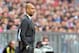 Bayern head coach Pep Guardiola looks on prior to the Bundesliga soccer match between FC Bayern Munich and Borussia Dortmund in Munich, Germany, on Saturday, April 12, 2014. (AP Photo/Kerstin Joensson)