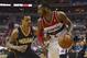 Mar 28, 2014; Washington, DC, USA; Washington Wizards guard John Wall (2) dribbles a Indiana Pacers guard George Hill (3) defends during the third quarter at Verizon Center. Washington Wizards defeated the Indiana Pacers 91-78. Mandatory Credit: Tommy Gilligan-USA TODAY Sports