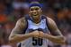 Memphis Grizzlies' Zach Randolph smiles during the second half of an NBA basketball game against the Phoenix Suns, Monday, April 14, 2014, in Phoenix. The Grizzlies won 97-91. (AP Photo/Matt York)