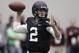 Texas A&M quarterback Johnny Manziel passes the ball during a drill at pro day for NFL football representatives in College Station, Texas, Thursday, March 27, 2014. (AP Photo/Patric Schneider)