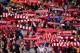 LIVERPOOL, ENGLAND - APRIL 15: Liverpool fans sing 'You'll Never Walk Alone' during the Hillsborough memorial service marking the 25th anniversary of the Hillsborough Disaster at Anfield stadium on April 15, 2014 in Liverpool, England. Thousands of fans, friends and relatives took part in the service at Liverpool's Anfield stadium to mark the 25th anniversary of the Hillsborough disaster. Bells across the City of Liverpool rung during a one minute silence. A total of 96 Liverpool supporters lost their lives during a crush at an FA Cup semi final against Nottingham Forest at the Hillsborough football ground in Sheffield, South Yorkshire in 1989. (Photo by Christopher Furlong/Getty Images)