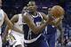 Oklahoma City Thunder forward Kevin Durant (35) drives to the basket against New Orleans Pelicans center Alexis Ajinca (42) in the first half of an NBA basketball game in New Orleans, Monday, April 14, 2014. (AP Photo/Gerald Herbert)