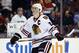 FILE - In this March 18, 2014, file photo, Chicago Blackhawks' Jonathan Toews skates during an NHL hockey game against the Philadelphia Flyers, in Philadelphia. The Blackhawks expect to have Toews and Patrick Kane in the lineup when they play at St. Louis on Thursday, April 17 after each had long layoffs to heal injuries. (AP Photo/Matt Slocum, File)