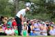 AUGUSTA, GA - APRIL 13: Bubba Watson of the Unted States putts on the sixth green as a gallery of patrons look on during the final round of the 2014 Masters Tournament at Augusta National Golf Club on April 13, 2014 in Augusta, Georgia. (Photo by Rob Carr/Getty Images)