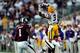 STARKVILLE, MS - OCTOBER 05: Odell Beckham Jr. #3 of the LSU Tigers goes up for a reception in front of Nickoe Whitley #1 of the Mississippi State Bulldogs during a game at Davis Wade Stadium on October 5, 2013 in Starkville, Mississippi. LSU won the game 59-26. (Photo by Stacy Revere/Getty Images)