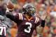 Virginia Tech quarterback Logan Thomas (3) tosses a pass during the first half of an NCAA college football game against Pittsburgh in Blacksburg, Va., Saturday, Oct. 12, 2013. (AP Photo/Steve Helber)