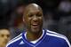 FILE - In this March 13, 2013, file photo, Los Angeles Clippers' Lamar Odom smiles during an NBA basketball practice in Los Angeles. Former NBA player Lamar Odom pleaded no contest to a drunken driving charge on Monday, Dec. 12, 2013, and accepted a sentence of three years’ probation and three months of alcohol abuse treatment. (AP Photo/Jae C. Hong, File)
