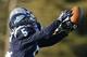 Maine defensive back Kendall James (5) breaks up a pass intended for New Hampshire wide receiver R.J. Harris (15) during the first half of an NCAA football playoff game, Saturday, Dec. 7, 2013, in Orono, Maine. (AP Photo/Robert F. Bukaty)