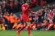 LIVERPOOL, ENGLAND - APRIL 13: Jordan Henderson of Liverpool walks off after being shown a red card by Referee Mark Clattenburg during the Barclays Premier League match between Liverpool and Manchester City at Anfield on April 13, 2014 in Liverpool, England. (Photo by Alex Livesey/Getty Images)