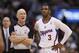 NBA referee Joey Crawford talks on the court with Los Angeles Clippers guard Chris Paul during the NBA basketball game between the Sacramento Kings and Los Angeles Clippers in Los Angeles, Saturday, April 12, 2014. The Clippers won 117-101. (AP Photo/Danny Moloshok)