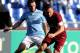 Roma forward Francesco Totti walks past the project for the new Roma soccer stadium, at Rome's Capitol Hill, Wednesday March 26, 2014. Three-time Serie A champion Roma has revealed plans to build a new privately financed stadium on the outskirts of the Italian capital. Labeled