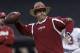 Alabama head coach Nick Saban throws a football during NCAA college football practice at the Superdome in New Orleans, Saturday, Dec. 28, 2013. Alabama takes on Oklahoma in the Sugar Bowl on Thursday, Jan. 2, 2014. (AP Photo/Gerald Herbert)