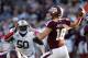 HOUSTON, TX- OCTOBER 19: Matt Joeckel #16 of the Texas A&M Aggies in the pocket while Ben Bradley #50 of the Auburn Tigers rushes on October 19, 2013 at Kyle Field in College Station, Texas. Auburn Tigers won 45 to 41.(Photo by Thomas B. Shea/Getty Images)