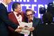 Cleveland Cavaliers owner Dan Gilbert congratulates his son Nick Gilbert after the team won the NBA basketball draft lottery, Tuesday, May 21, 2013 in New York. (AP Photo/Jason DeCrow)